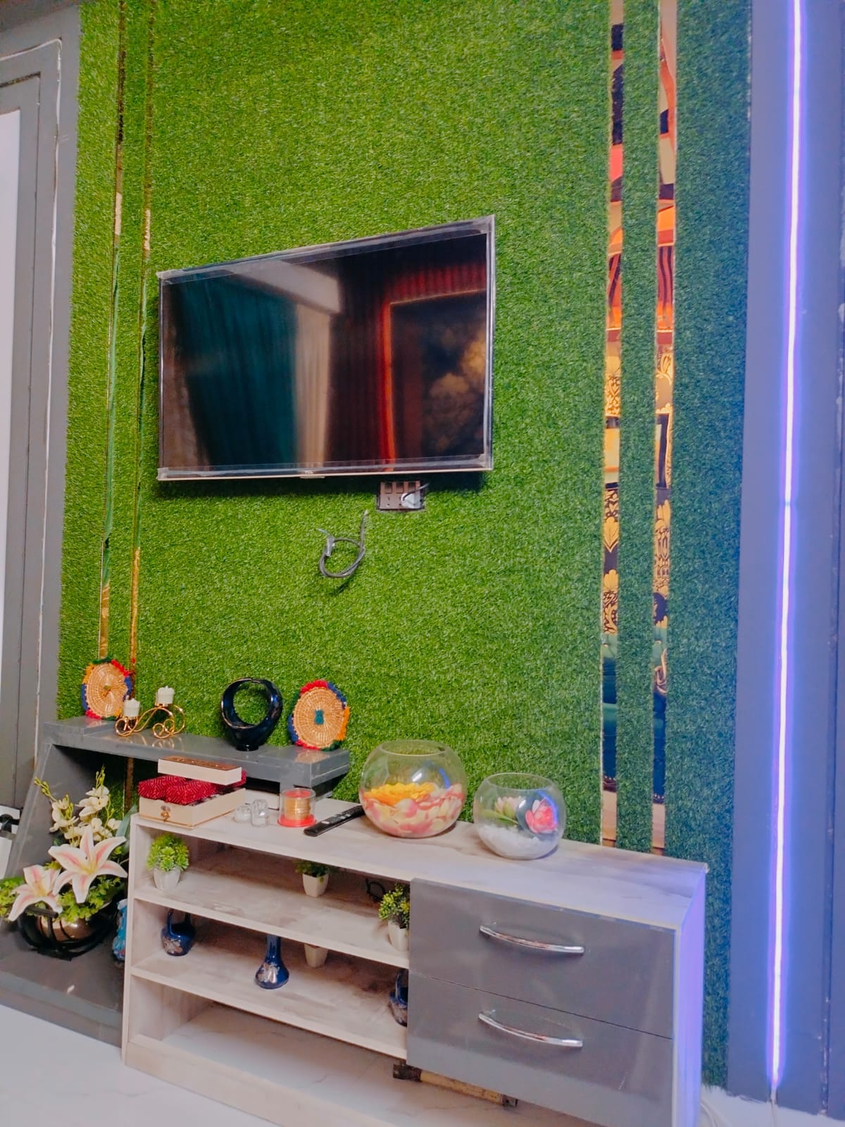 media wall after renovation in 2 bed flat in karachi
