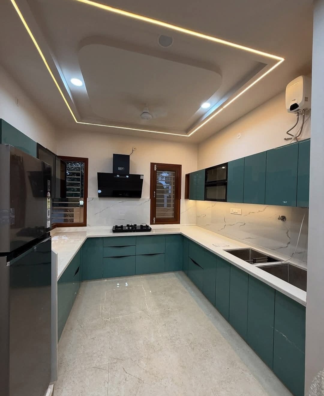 High gloss kitchen cabinets installed by Etminaan Services in Karachi.